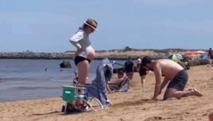 Posnetek s plaže je zbral več kot 7 milijonov ogledov! Poglejte, kaj je mož naredil za nosečnico!